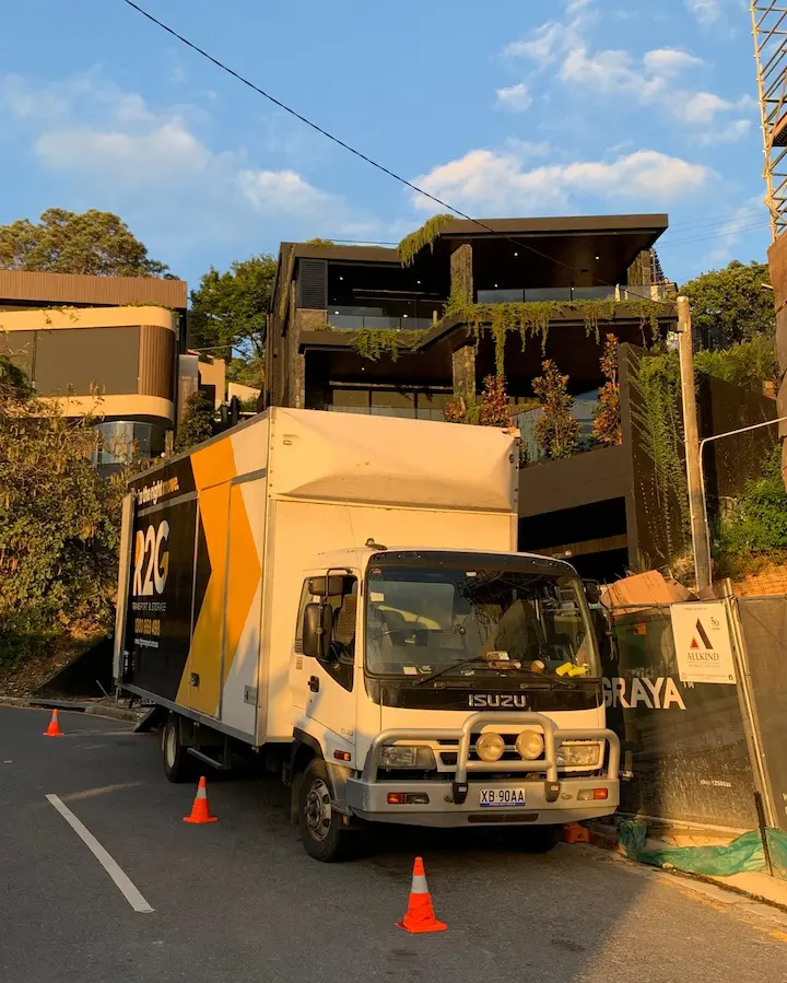 How to choose a removalist, R2G Transport branded moving truck on a residential street ready for pickup