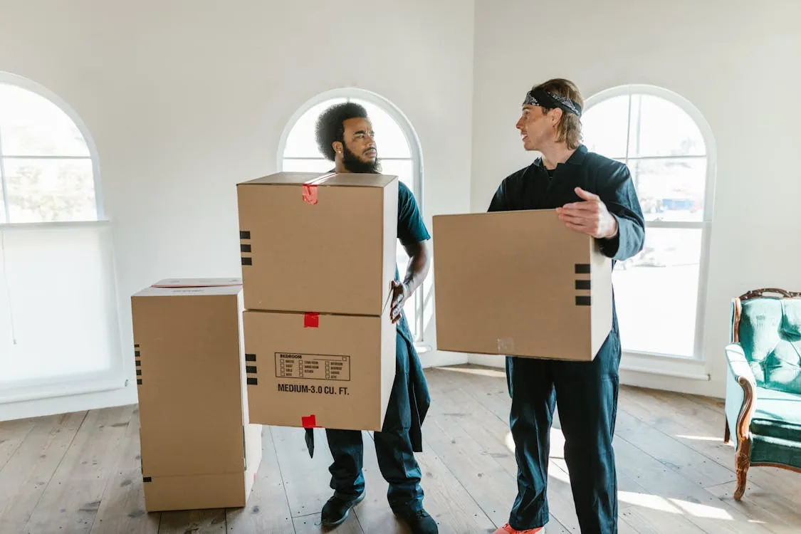 Reliable Brisbane removalists team with a fully equipped moving truck in a suburban Brisbane street