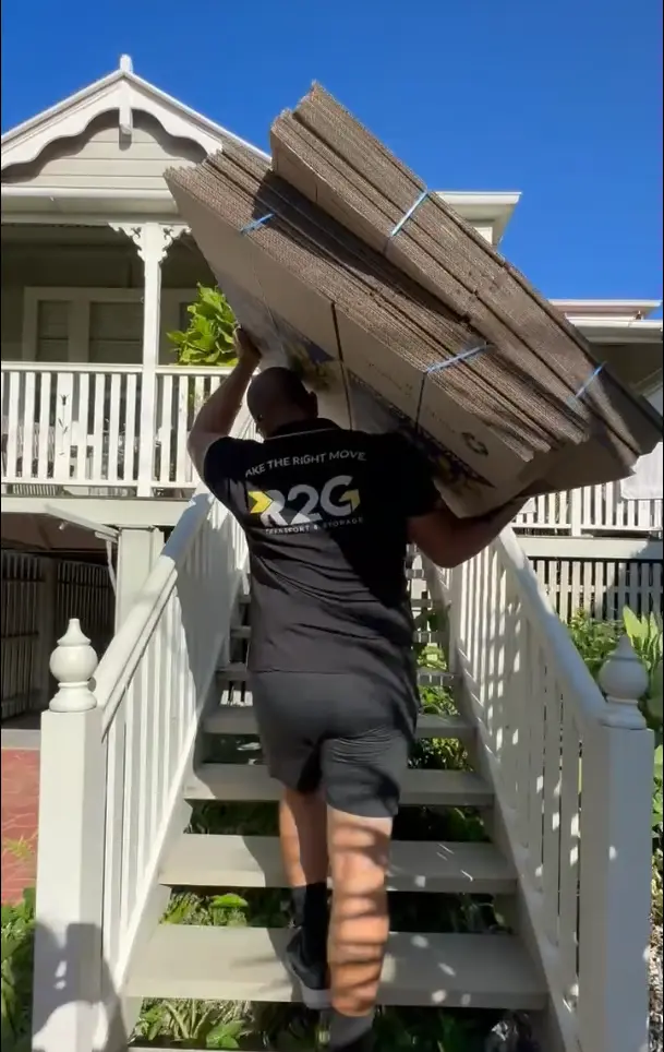 R2G removalists loading furniture for a Brisbane to Moranbah interstate move